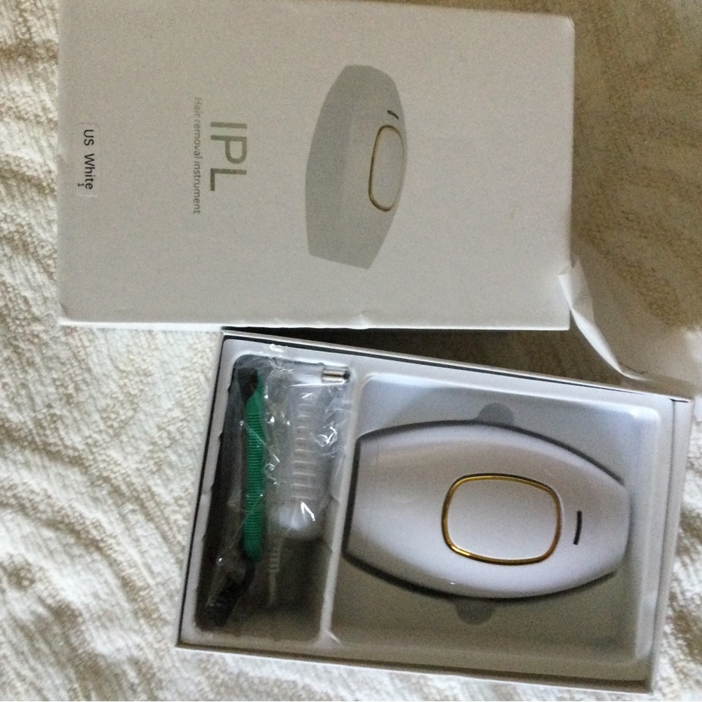 IPL Hair Removal Device with Gold Trim